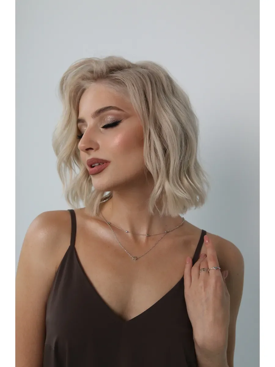 Women's neck chain in silver with a heart